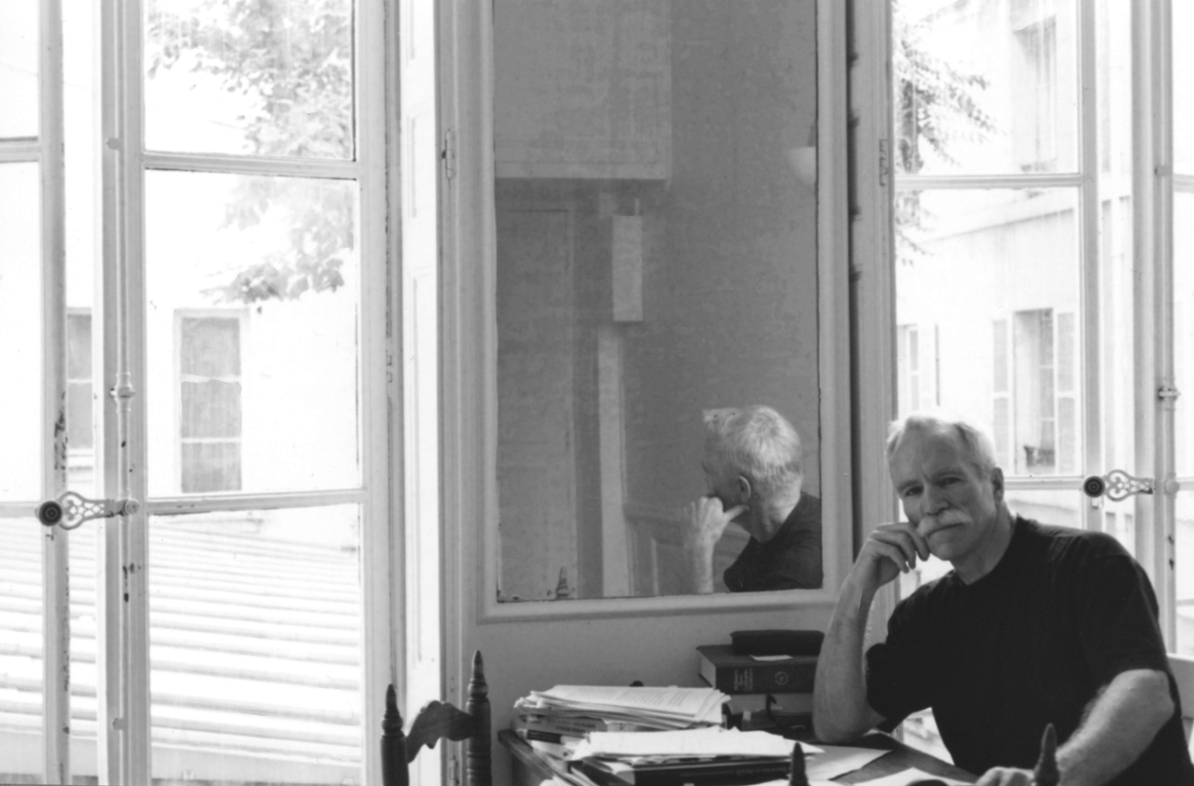 TC at desk in old office